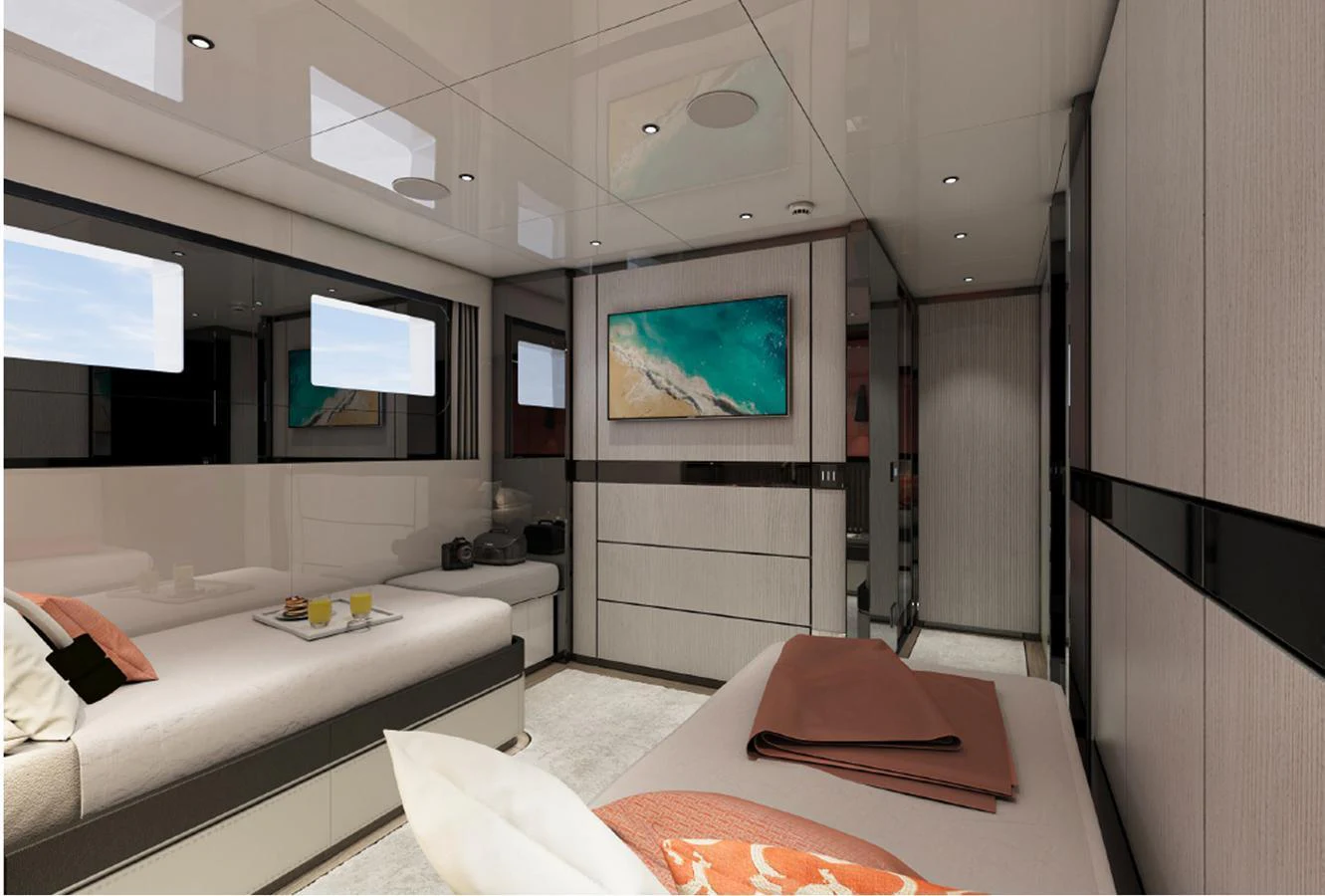 This elegant stateroom features modern decor and ample natural light. aboard AES Yacht for Sale