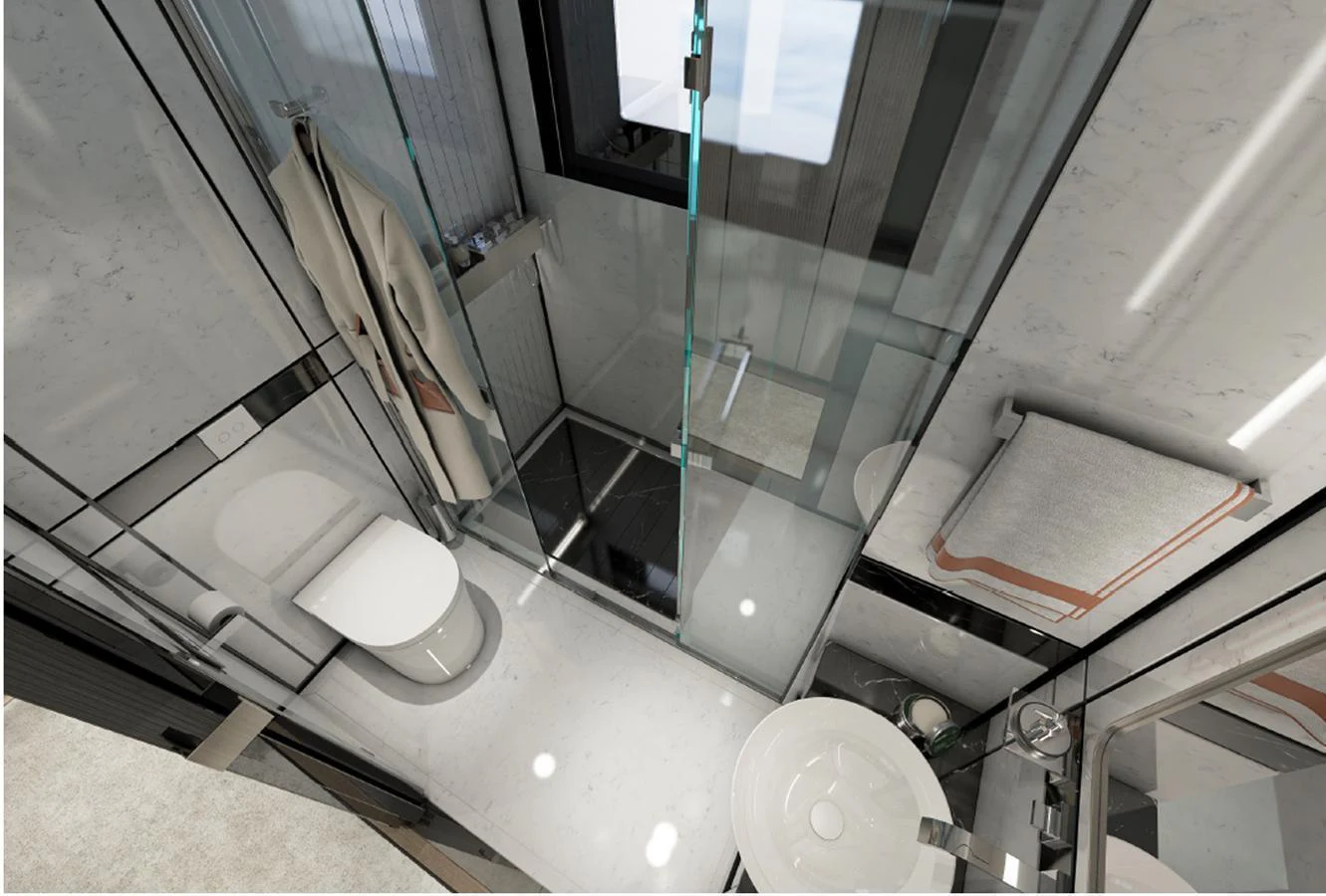 A sleek and modern yacht bathroom with a glass-enclosed shower and elegant fixtures. aboard AES Yacht for Sale