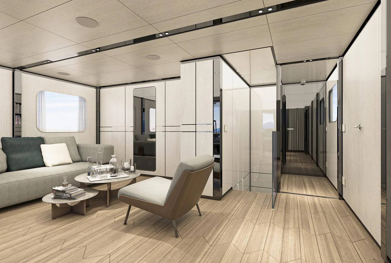 The salon features modern furnishings with a sleek, minimalist design. aboard AES Yacht for Sale