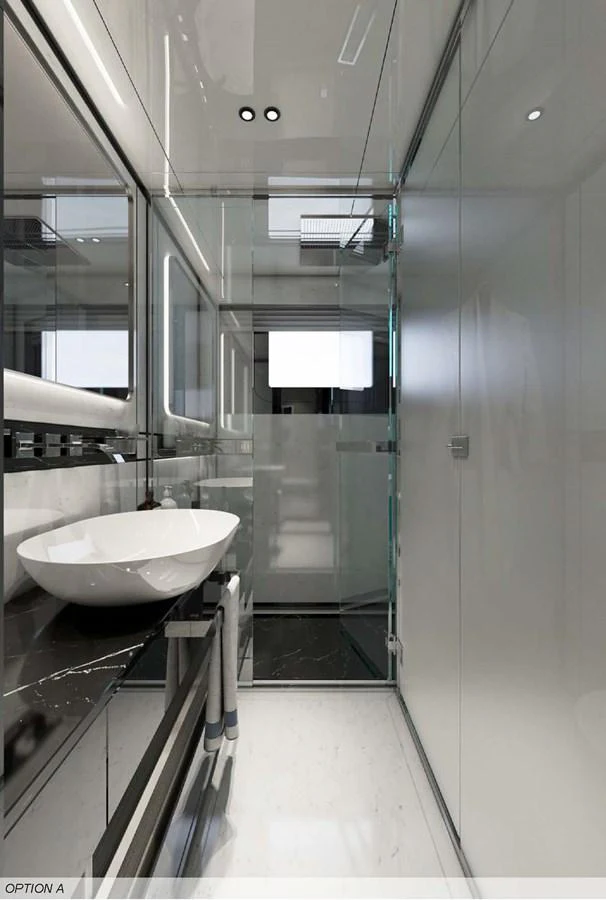 A sleek and modern bathroom with a glass-enclosed shower and elegant fixtures. aboard AES 85 Yacht for Sale