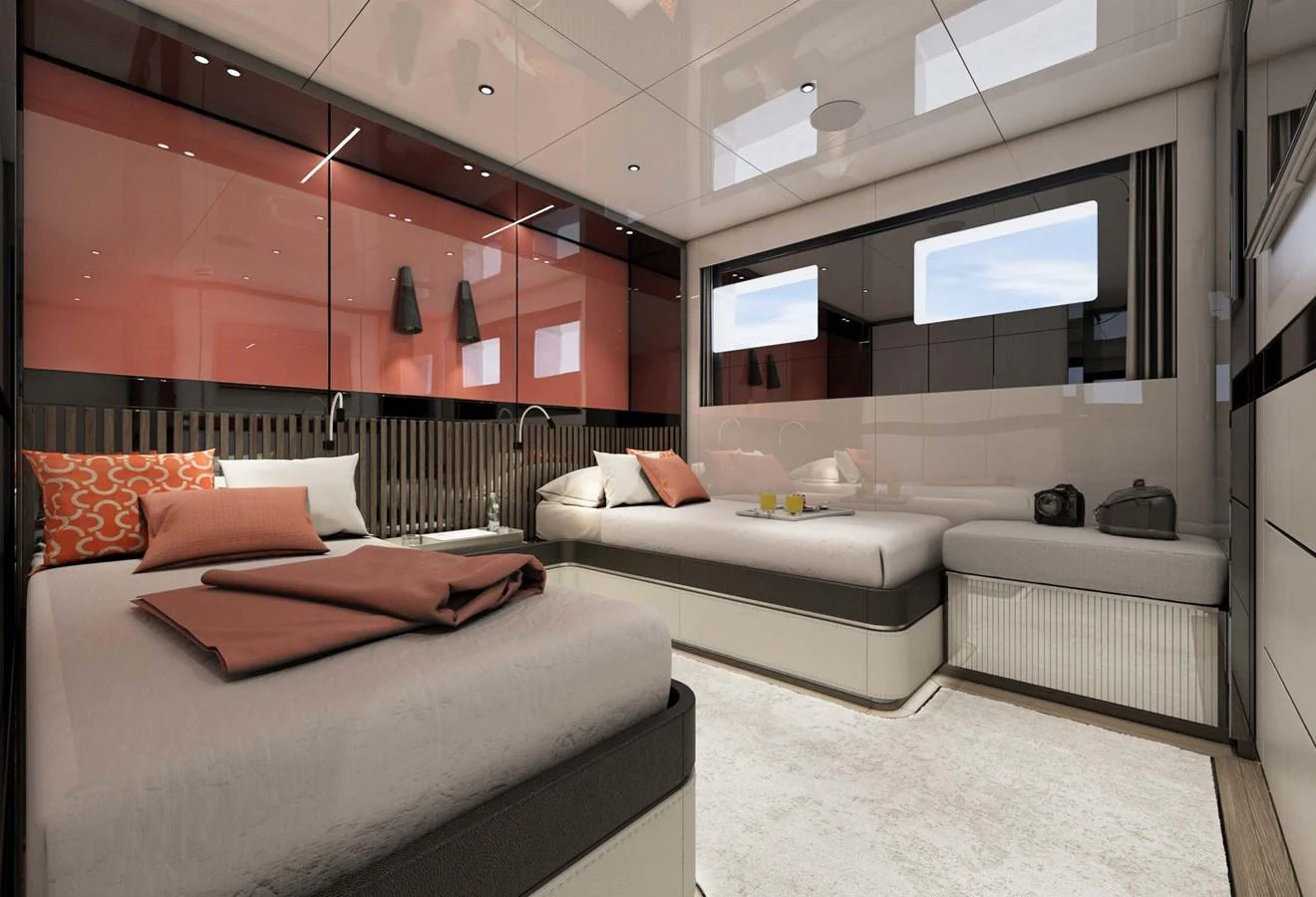 The guest stateroom features two single beds with modern decor and ample natural light. aboard AES 85 Yacht for Sale