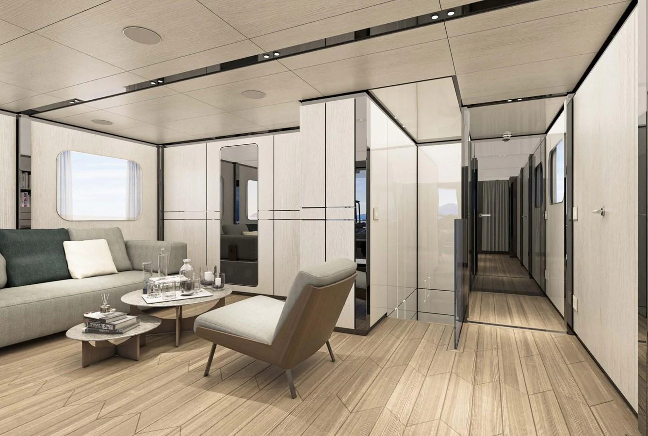 The yacht's interior features a modern and spacious living area with sleek furnishings and ample natural light. aboard AES 85 Yacht for Sale