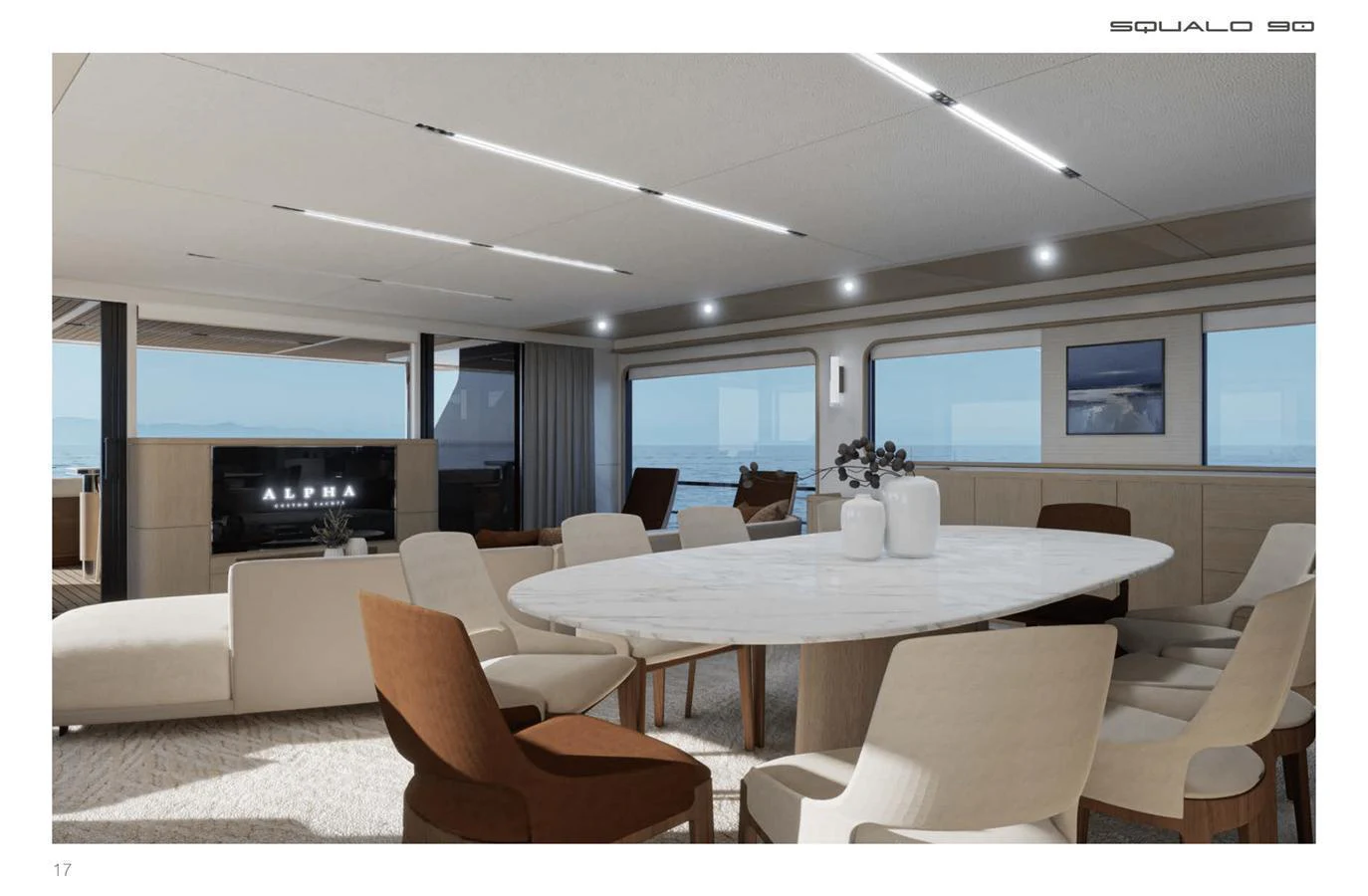 The spacious salon features a luxurious dining area with a large marble table and comfortable seating, perfect for entertaining guests. aboard SQUALO 90 Yacht for Sale