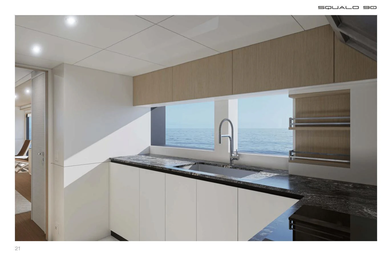 The galley features modern cabinetry and a sleek countertop with an ocean view. aboard SQUALO 90 Yacht for Sale