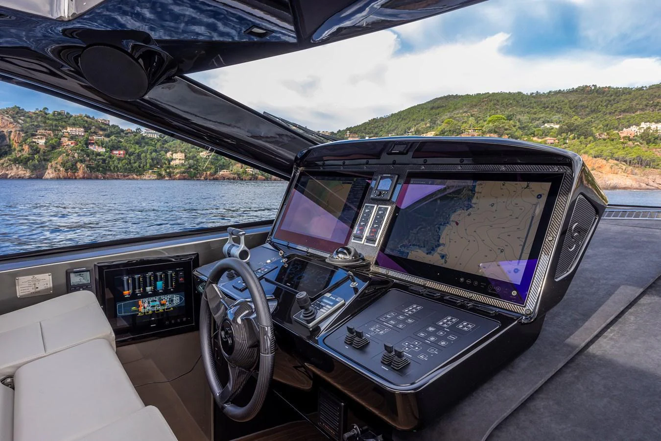 The helm station offers advanced navigation technology with panoramic views of the surrounding waters. aboard SEXY ME Yacht for Sale