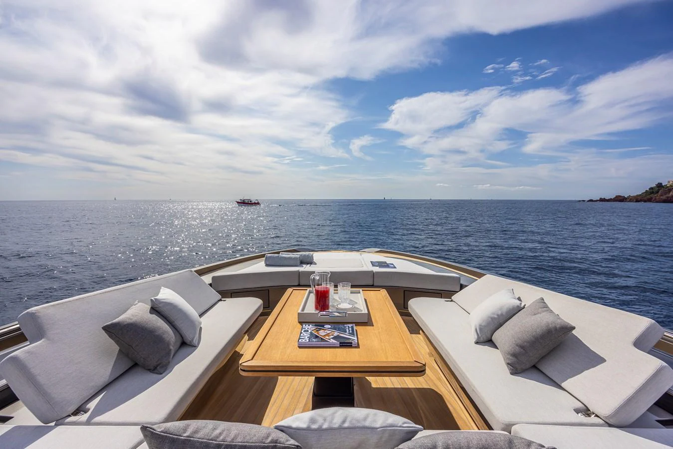 The foredeck features a spacious lounging area with comfortable seating and a stunning view of the open sea. aboard SEXY ME Yacht for Sale