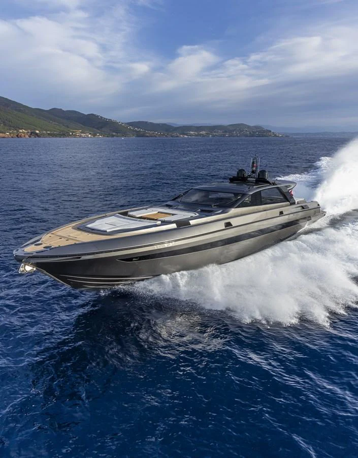 A sleek and modern yacht cruises swiftly through the open sea, showcasing its powerful design. aboard SEXY ME Yacht for Sale