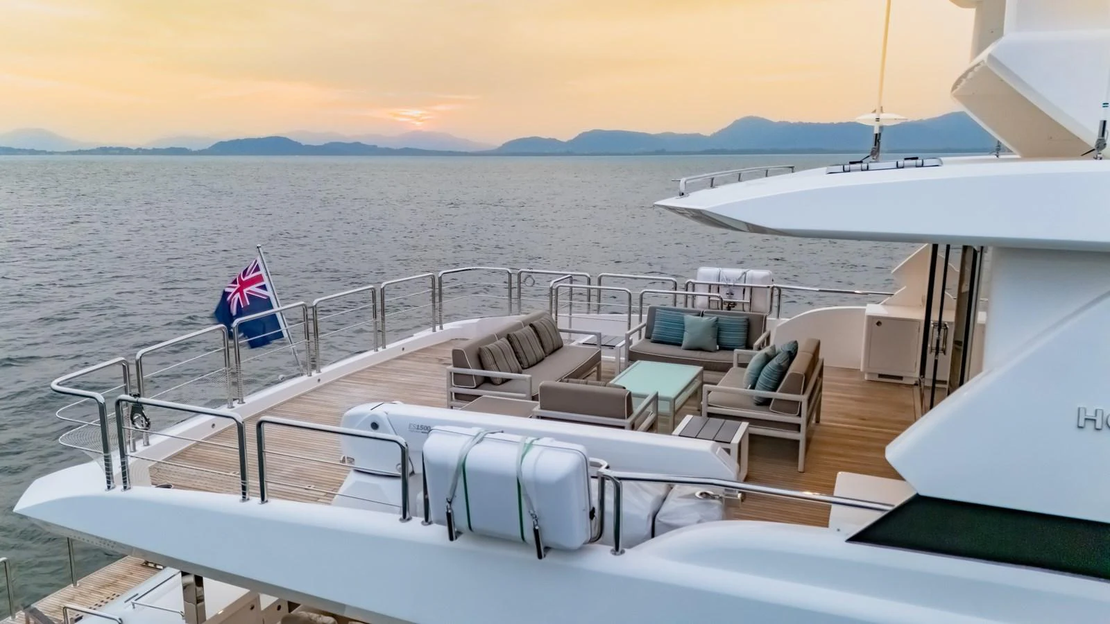 The aft deck offers a spacious and elegant outdoor seating area with stunning views of the water. aboard AVELINE Yacht for Sale