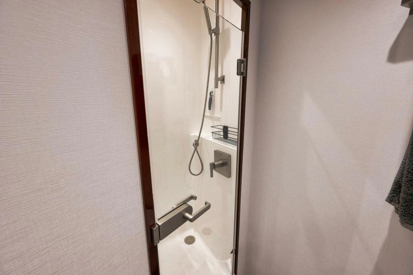 A sleek and modern shower area with clean lines and contemporary fixtures. aboard NIKKI BELLA Yacht for Sale