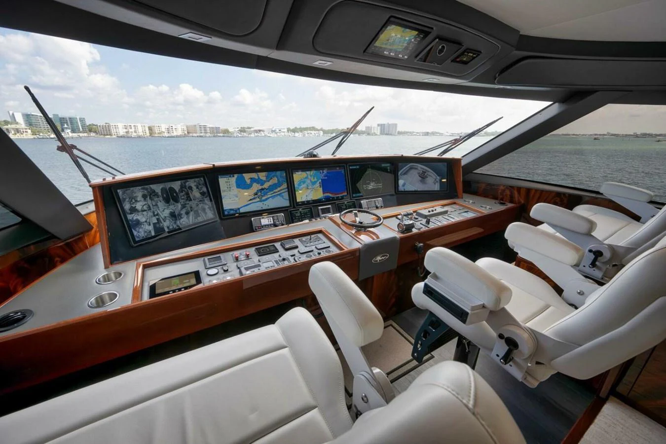 The helm station offers a commanding view with advanced navigation systems and luxurious seating. aboard NIKKI BELLA Yacht for Sale