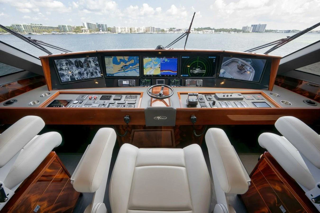 The helm station offers a commanding view with advanced navigation systems and luxurious seating. aboard NIKKI BELLA Yacht for Sale