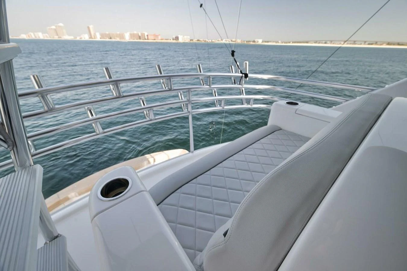 The sundeck offers a comfortable lounging area with a stunning view of the water. aboard NIKKI BELLA Yacht for Sale