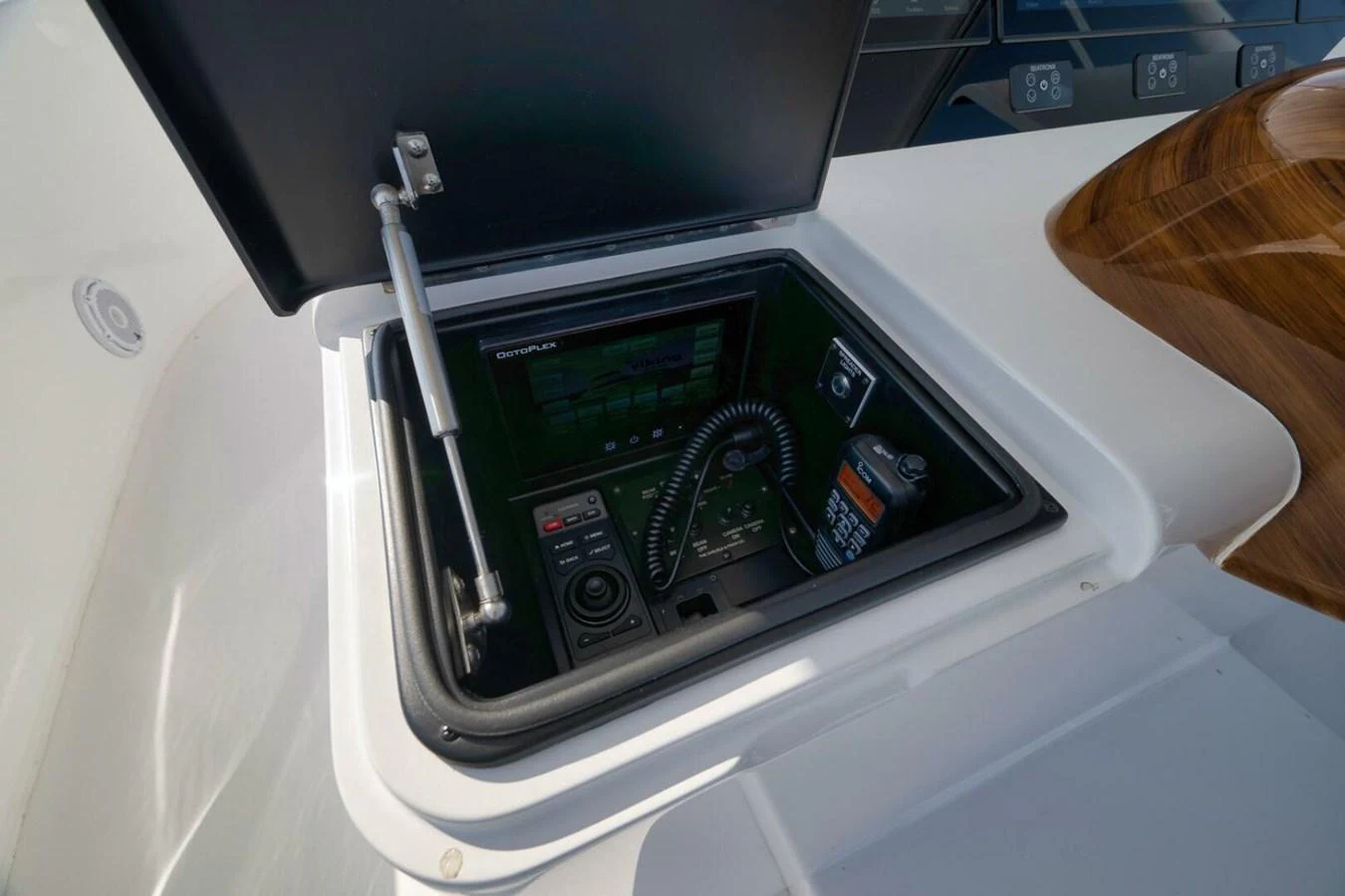 A detailed view of the yacht's helm control panel, showcasing advanced navigation equipment. aboard NIKKI BELLA Yacht for Sale