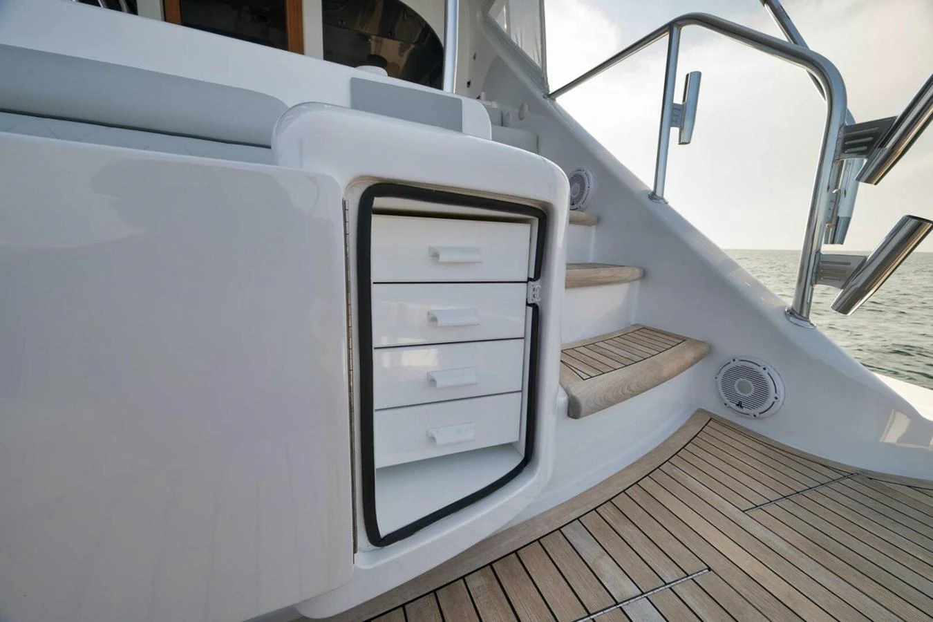 The image showcases a set of drawers on the deck of a yacht, highlighting practical storage solutions. aboard NIKKI BELLA Yacht for Sale