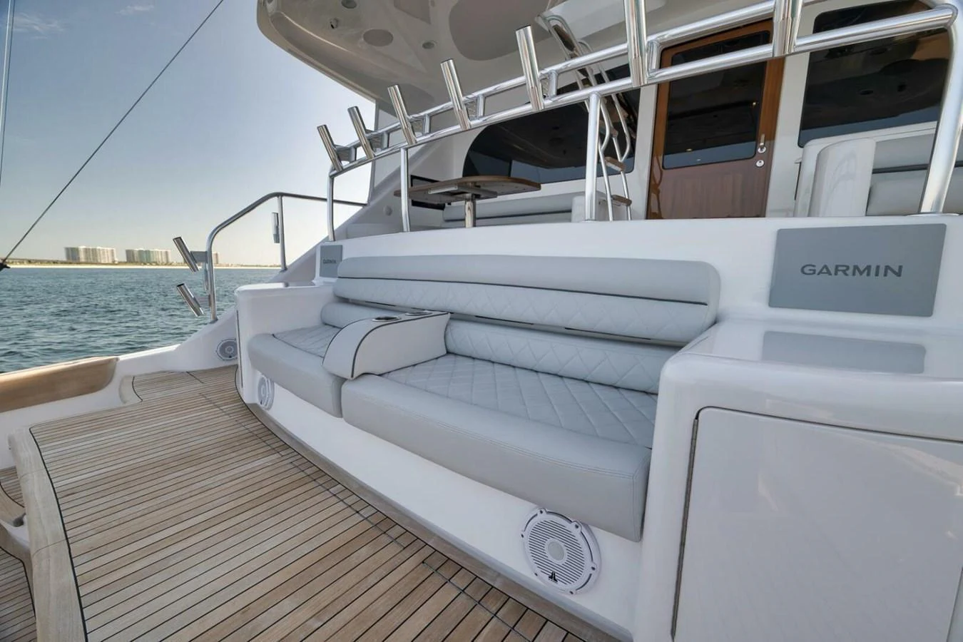 The aft deck features a spacious and comfortable seating area with a sleek design. aboard NIKKI BELLA Yacht for Sale