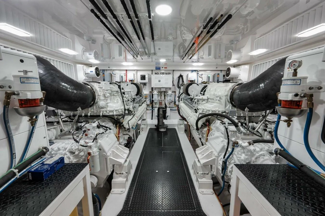The engine room showcases powerful machinery and a pristine, well-organized layout. aboard NIKKI BELLA Yacht for Sale