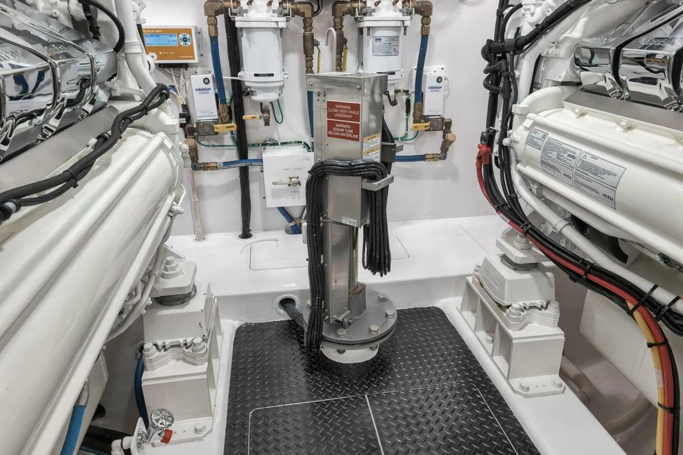 The image showcases the well-maintained engine room of the yacht, highlighting its mechanical components and systems. aboard NIKKI BELLA Yacht for Sale