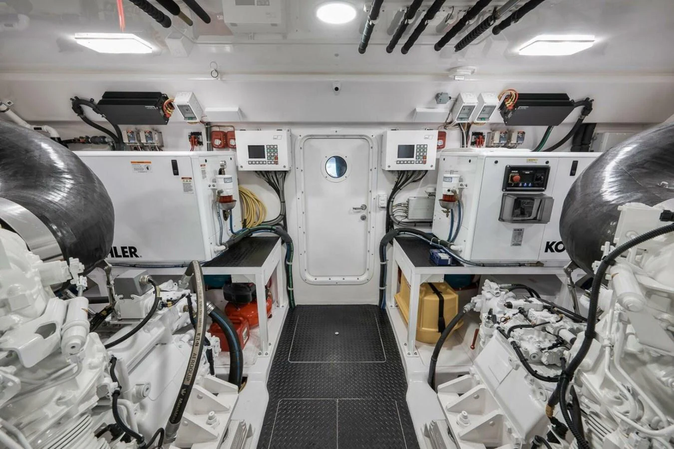 The engine room is meticulously organized, showcasing advanced machinery and equipment. aboard NIKKI BELLA Yacht for Sale