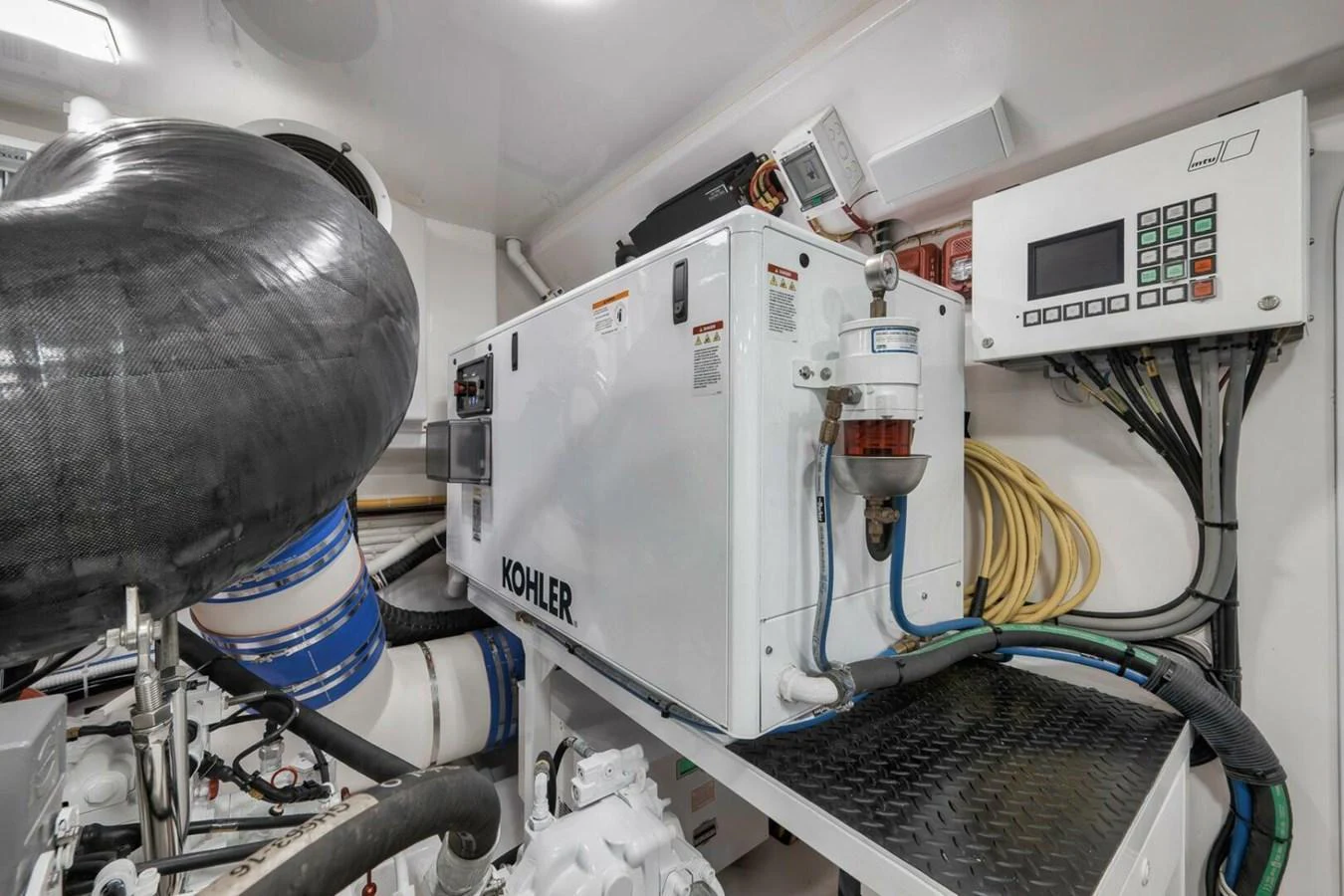 The image showcases the well-maintained engine room with advanced machinery and equipment. aboard NIKKI BELLA Yacht for Sale