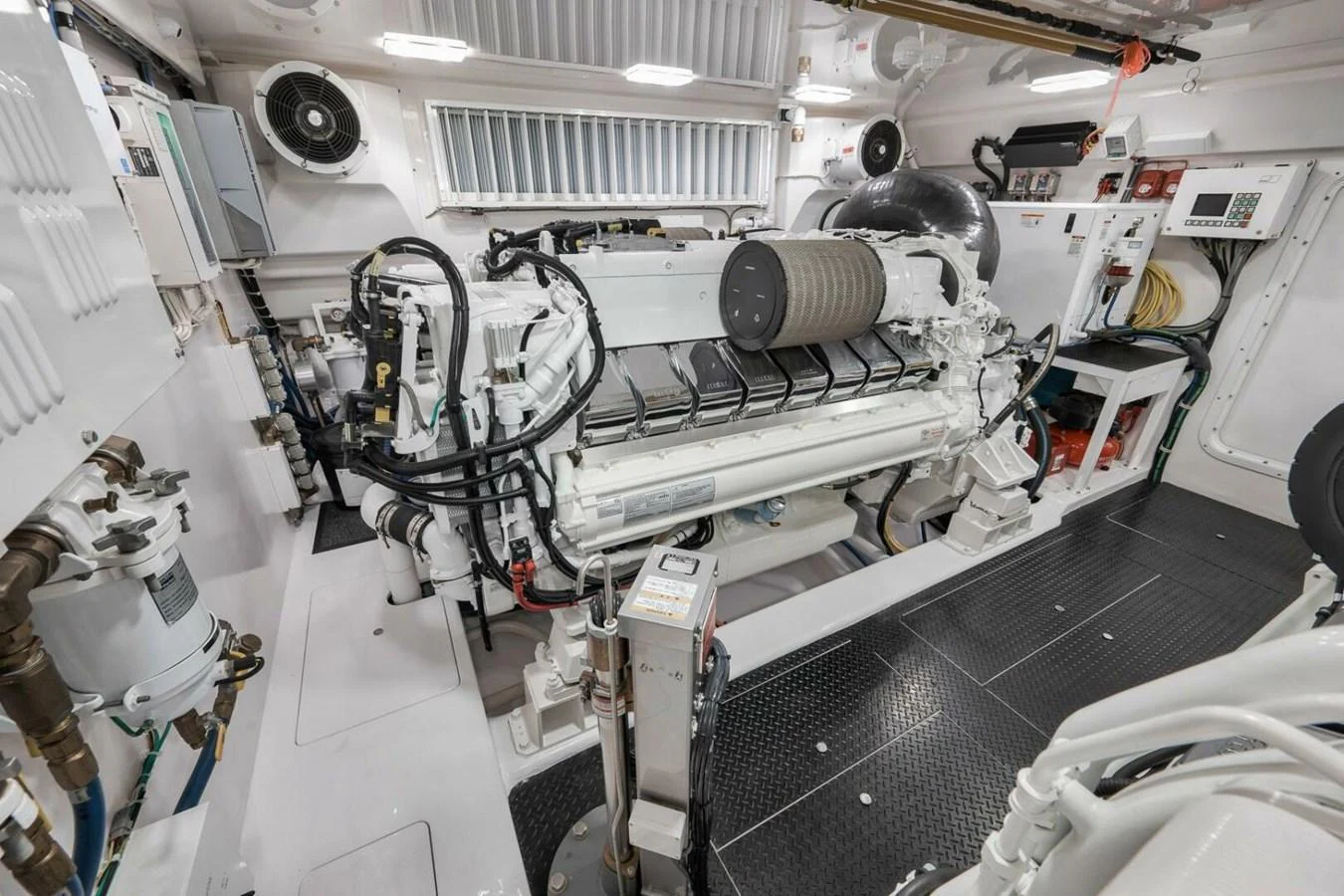 The engine room showcases a meticulously maintained and powerful engine setup. aboard NIKKI BELLA Yacht for Sale