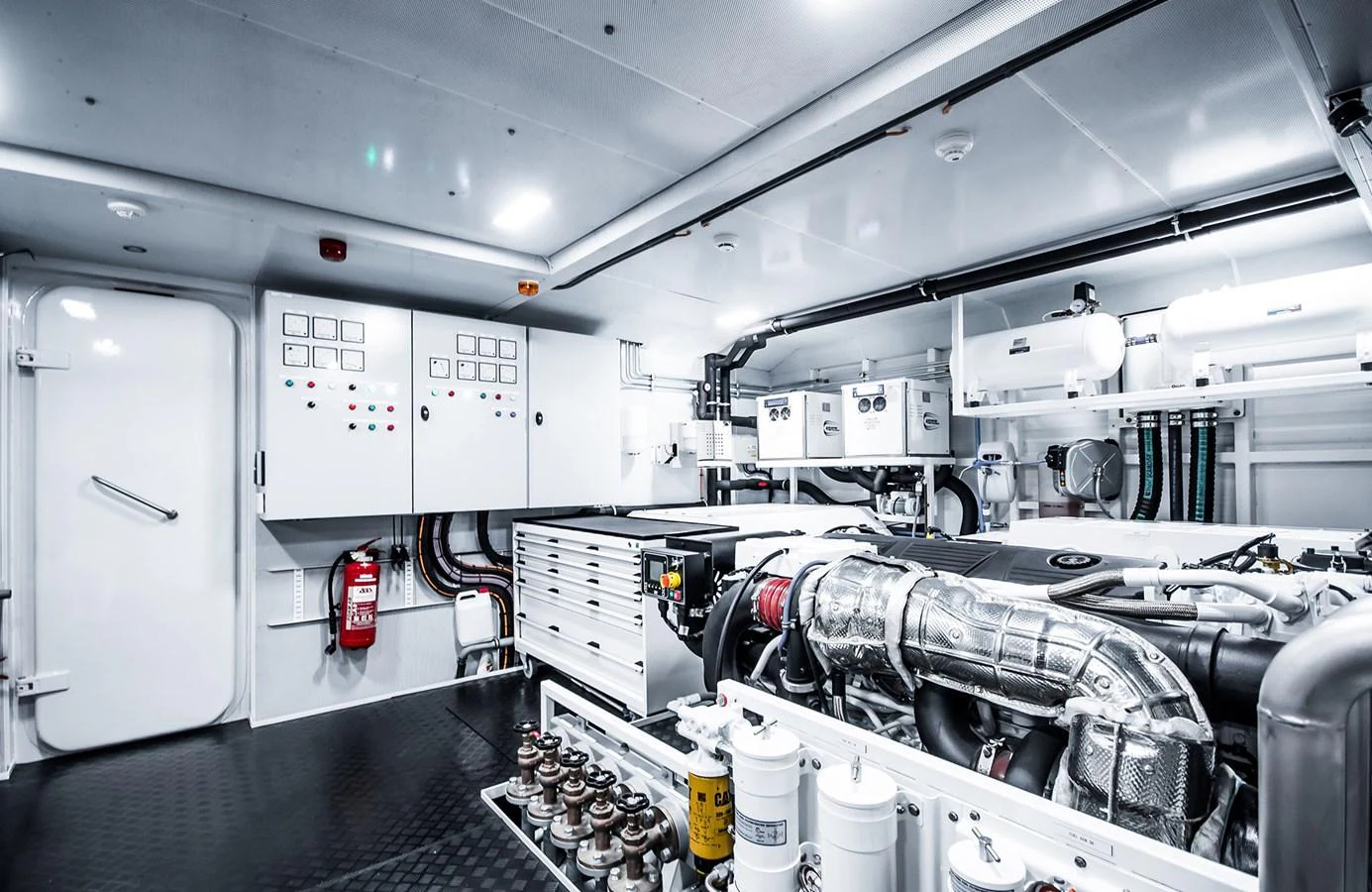 The engine room is meticulously organized with advanced machinery and control panels. aboard 27 YXT Yacht for Sale