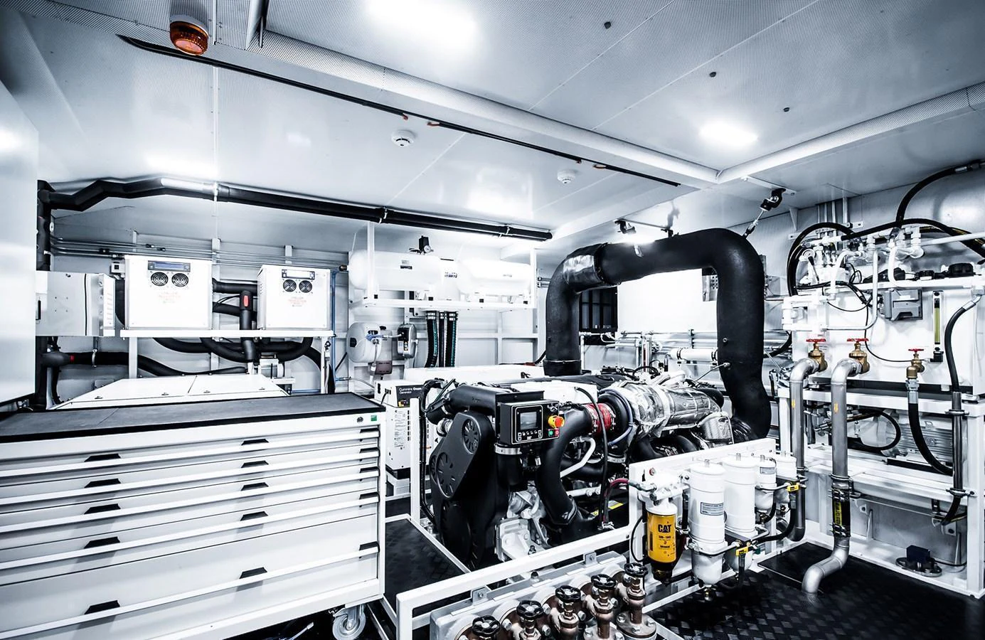 The engine room showcases advanced machinery and a well-organized layout, emphasizing the yacht's engineering excellence. aboard 27 YXT Yacht for Sale