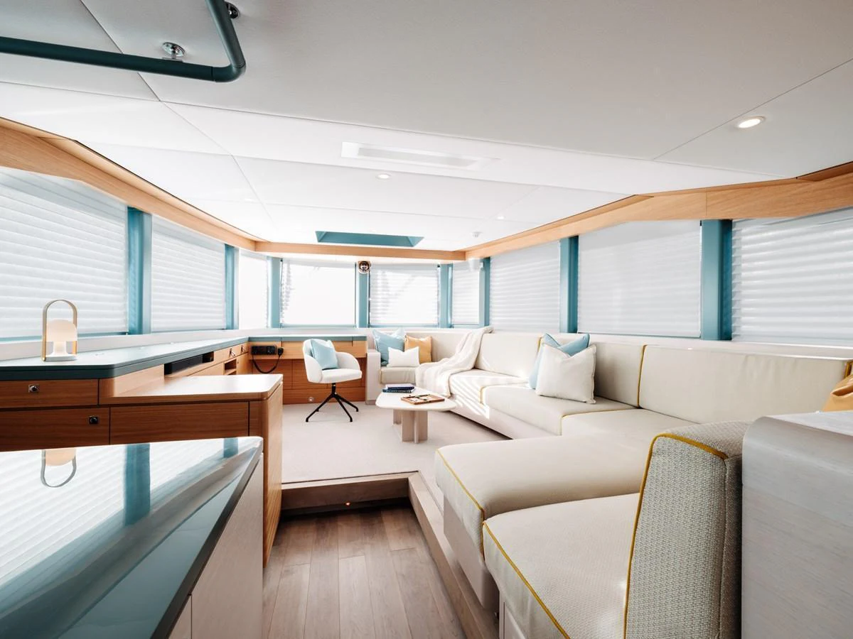 The salon features a spacious and modern design with ample seating and natural light. aboard ARKSEN 85 Yacht for Sale
