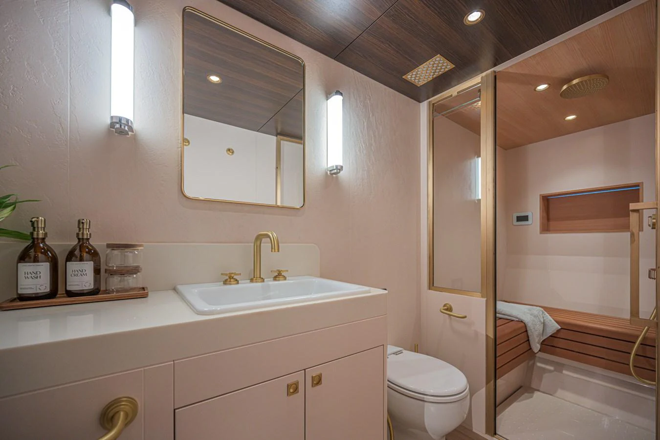 This elegant yacht bathroom features modern fixtures and a spacious shower area. aboard ARKSEN 85 Yacht for Sale