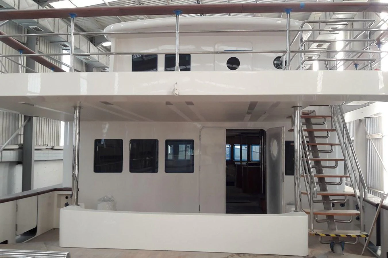 The yacht features a spacious aft deck with clean lines and modern design. aboard SVETLANA Yacht for Sale