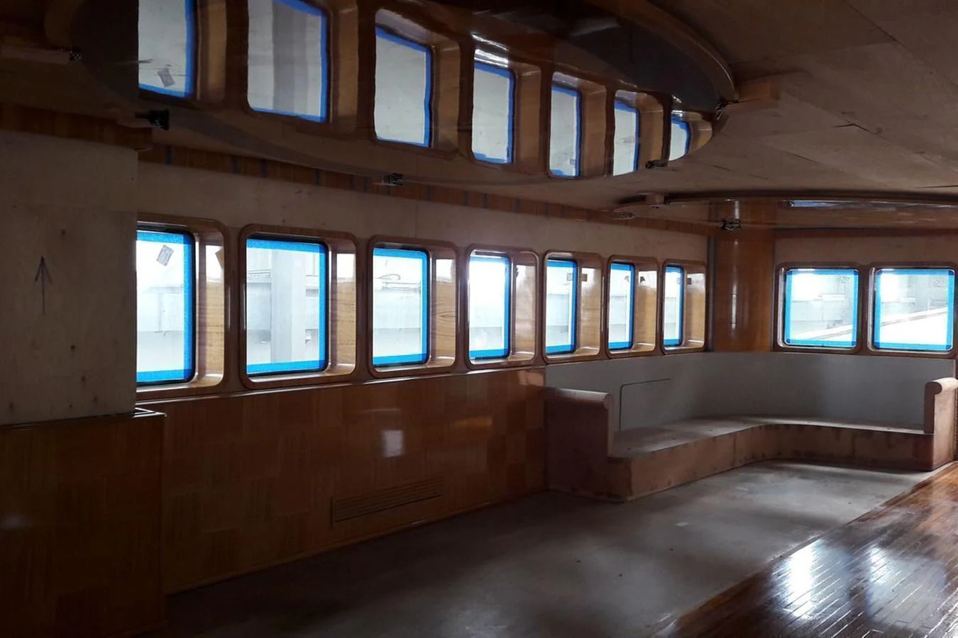 The yacht's interior features a spacious seating area with large windows providing ample natural light. aboard SVETLANA Yacht for Sale