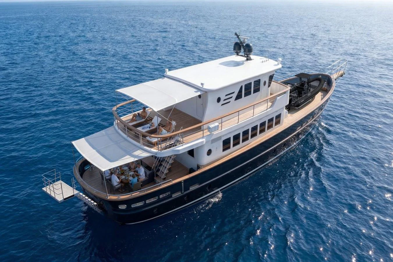 A stunning yacht cruises gracefully on the open sea, showcasing its elegant design and spacious decks. aboard SVETLANA Yacht for Sale