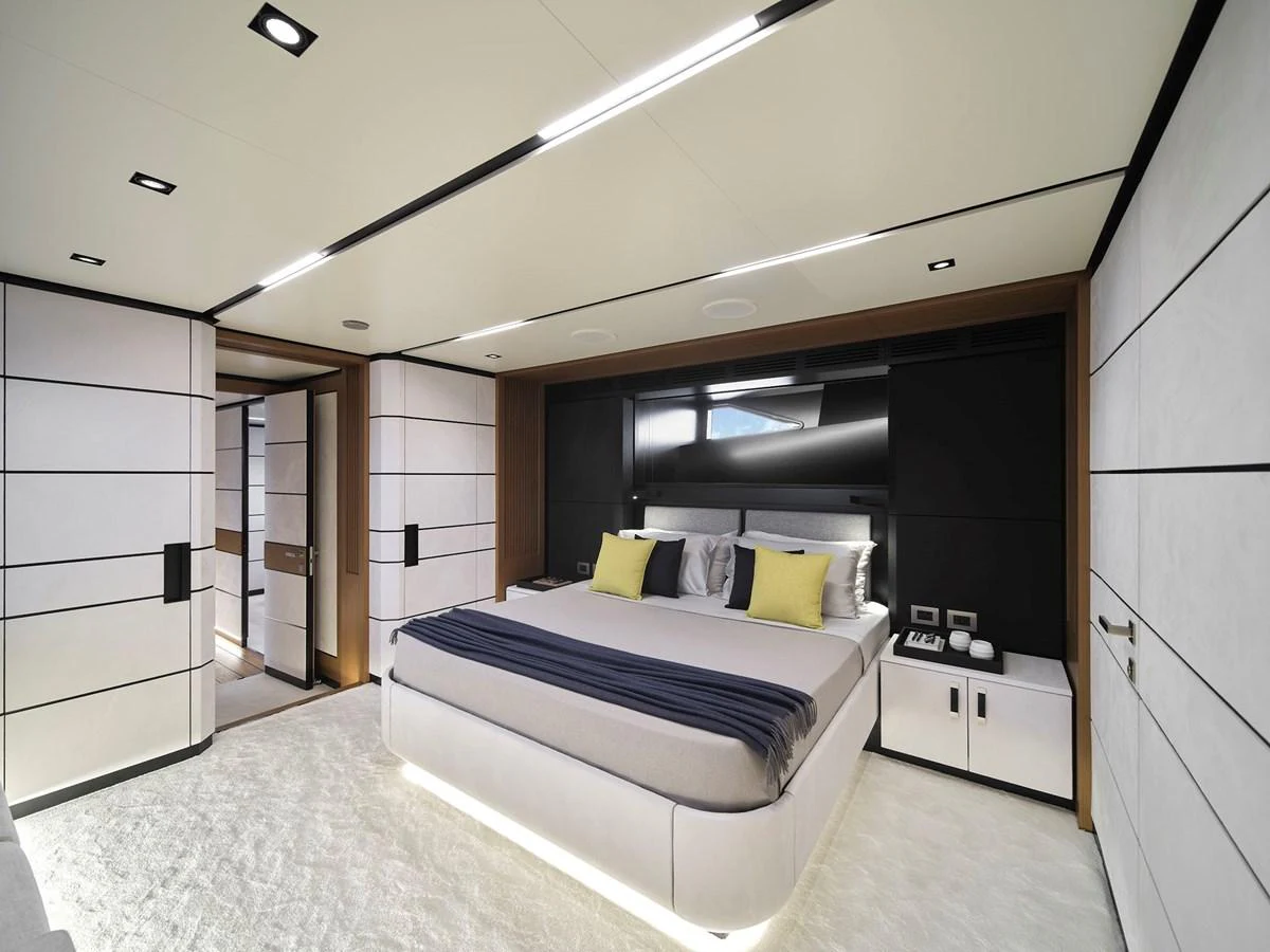 The master stateroom features a modern design with luxurious bedding and ample lighting. aboard WALLYWHY200 Yacht for Sale