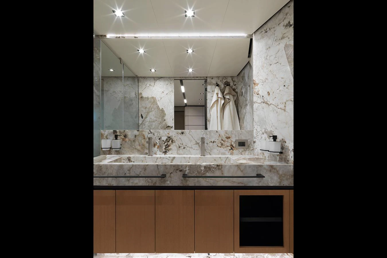 The yacht's bathroom features elegant marble surfaces and modern fixtures. aboard WALLYWHY200 Yacht for Sale