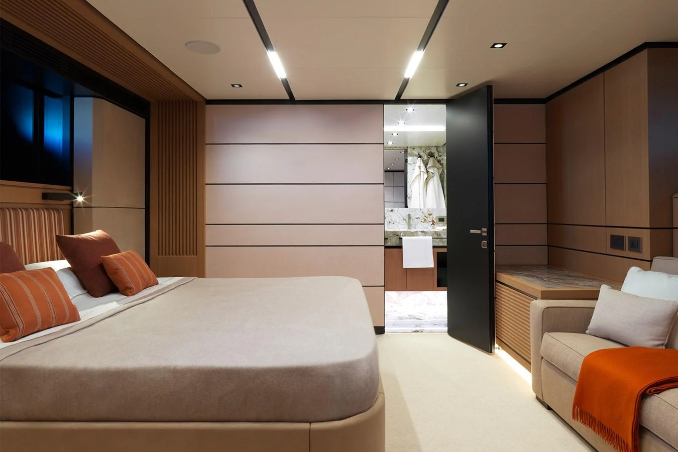 The stateroom features a luxurious bed, comfortable seating, and elegant decor. aboard WALLYWHY200 Yacht for Sale
