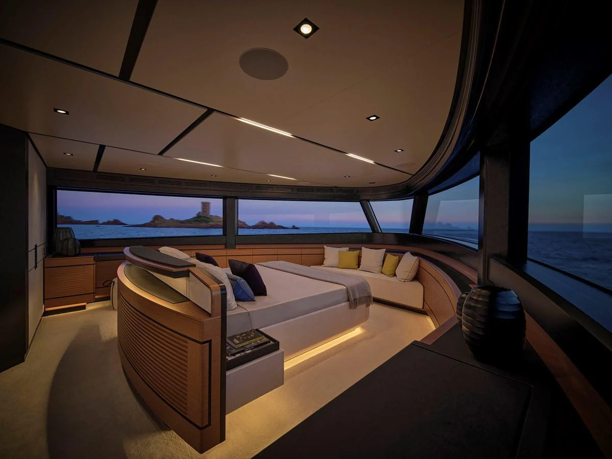 The master stateroom offers panoramic views and luxurious comfort with elegant lighting and modern furnishings. aboard WALLYWHY200 Yacht for Sale