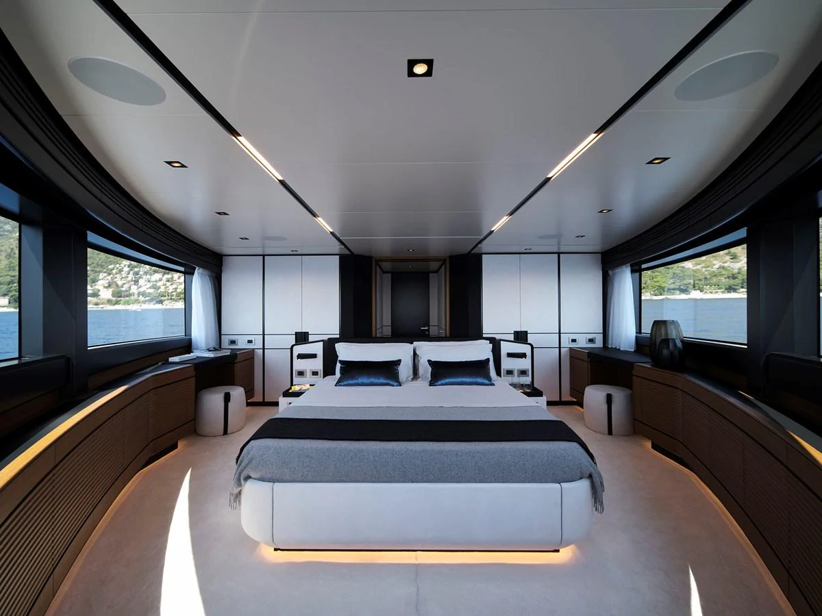 The master stateroom features a spacious and modern design with panoramic windows offering stunning views. aboard WALLYWHY200 Yacht for Sale