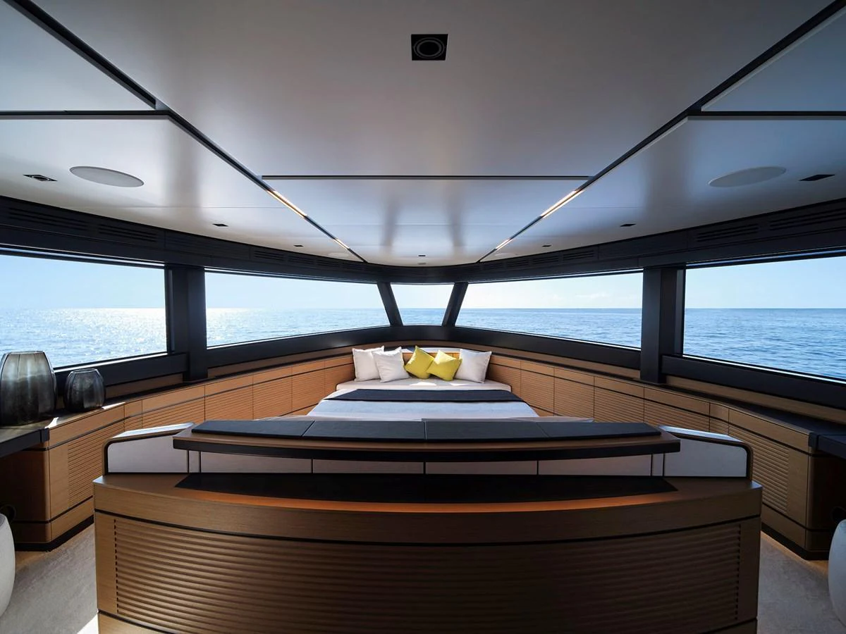 The master stateroom offers panoramic ocean views with modern, sleek design elements. aboard WALLYWHY200 Yacht for Sale