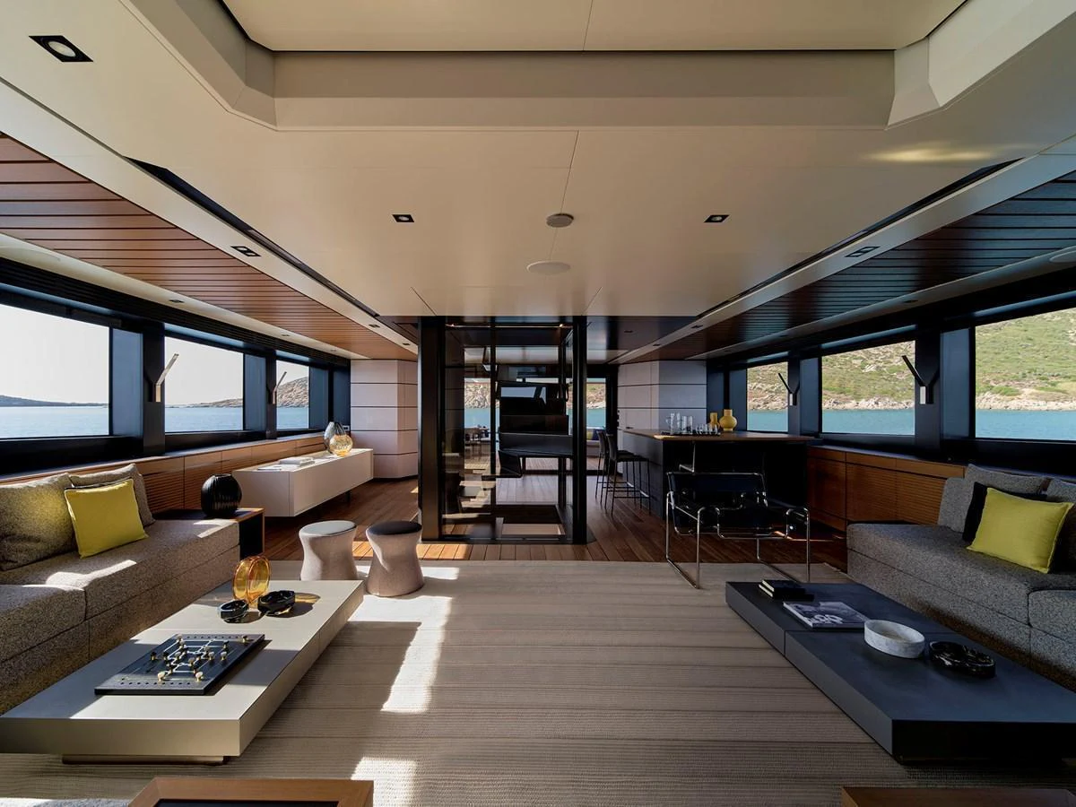 The spacious salon offers a luxurious and modern setting with ample seating and panoramic views. aboard WALLYWHY200 Yacht for Sale