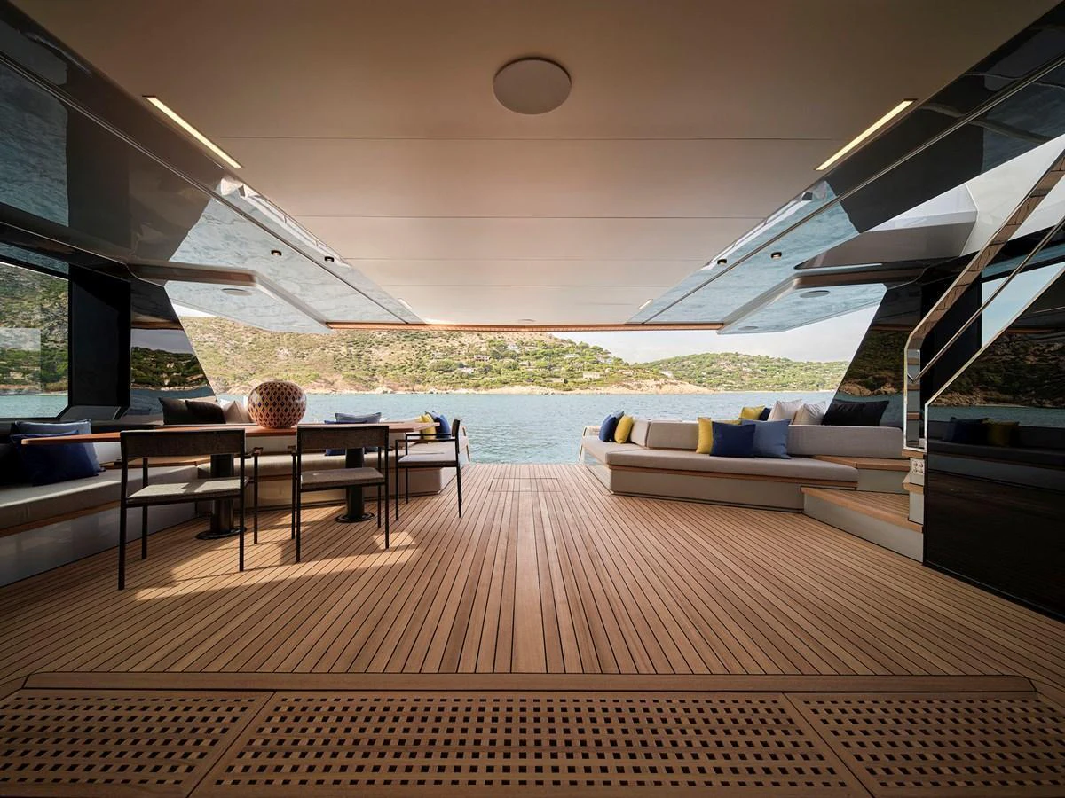 The aft deck offers a spacious and inviting area with comfortable seating and stunning views of the water. aboard WALLYWHY200 Yacht for Sale