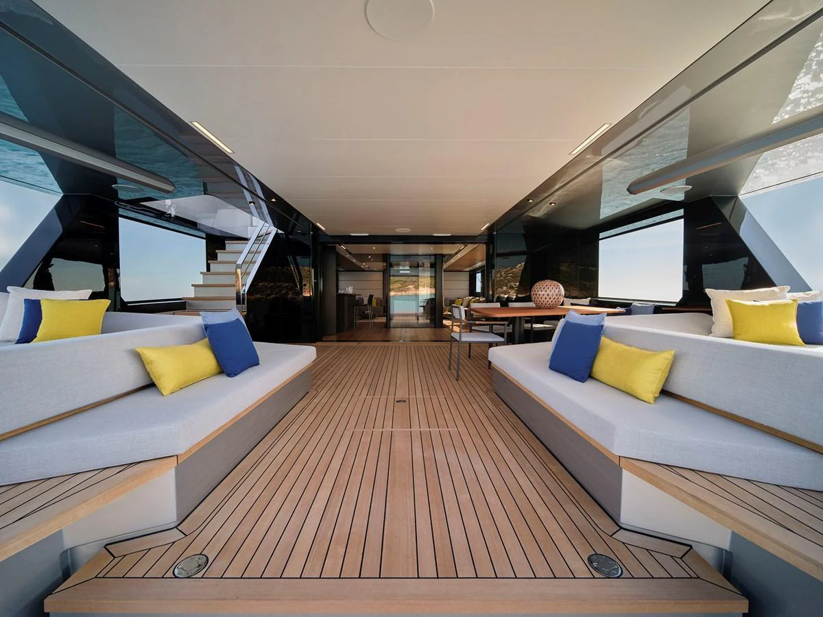 The aft deck features spacious seating with plush cushions, perfect for relaxation and socializing. aboard WALLYWHY200 Yacht for Sale