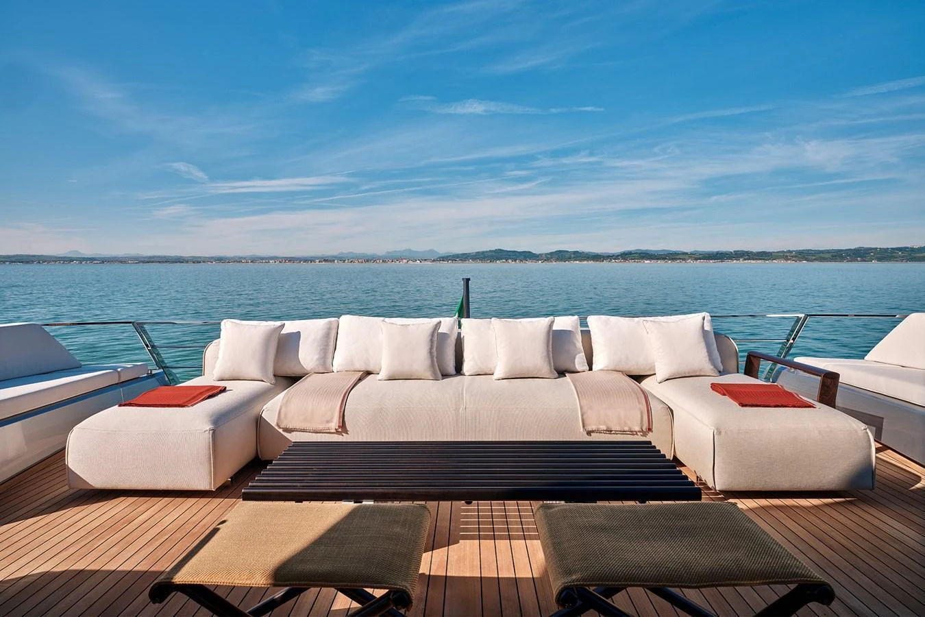 The sundeck offers a luxurious lounging area with plush seating and stunning ocean views. aboard WALLYWHY200 Yacht for Sale