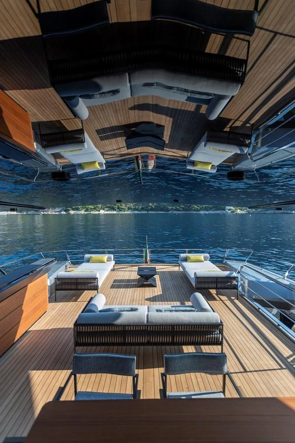 The yacht's aft deck offers a luxurious space for relaxation and socializing with stunning water views. aboard WALLYWHY200 Yacht for Sale