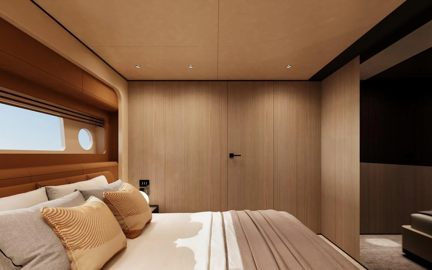 The stateroom features a luxurious bed with elegant bedding and warm wood finishes. aboard A80NEW Yacht for Sale