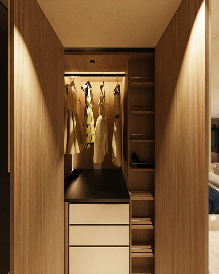 A well-organized yacht closet with elegant lighting and ample storage space. aboard A80NEW Yacht for Sale
