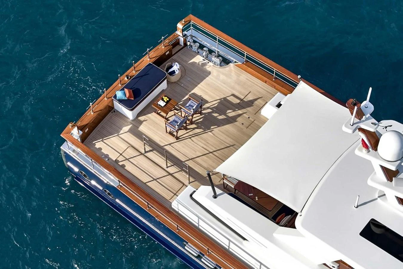 The aft deck offers a luxurious space for relaxation and dining with stunning ocean views. aboard PICCHIOTTI 24 Yacht for Sale