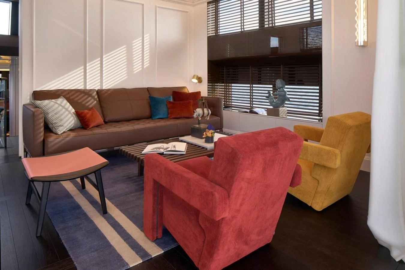 The yacht's interior features a stylish and comfortable living area with modern furnishings. aboard PICCHIOTTI 24 Yacht for Sale