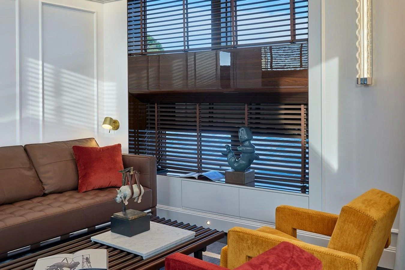 The yacht's interior features a stylish and cozy seating area with modern furnishings and elegant decor. aboard PICCHIOTTI 24 Yacht for Sale