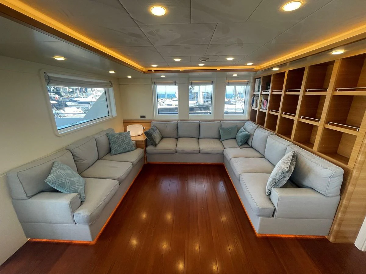 The yacht's salon features a spacious and inviting seating area with ample natural light. aboard STELLA DEL NORD Yacht for Sale