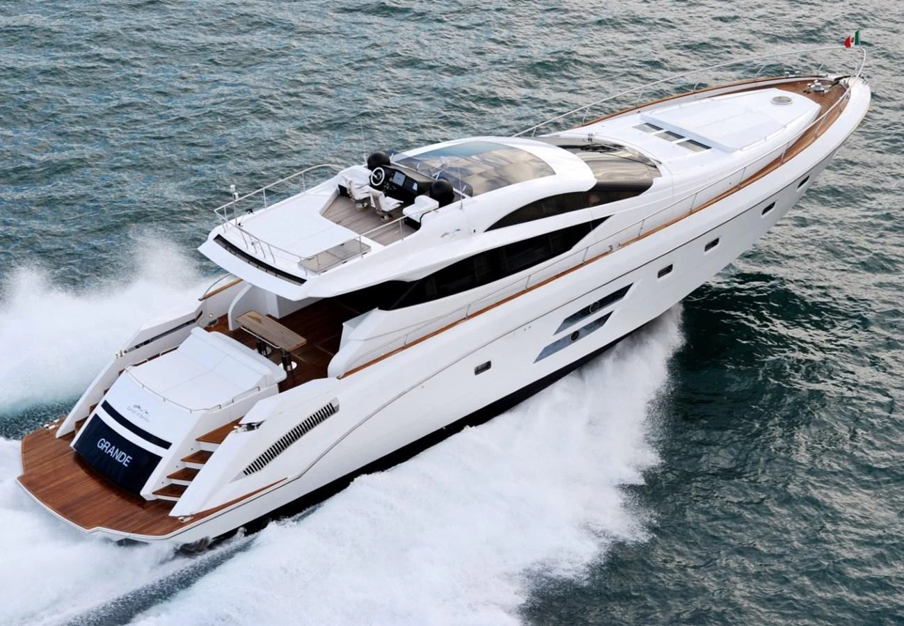 A sleek and modern yacht glides swiftly through the water, showcasing its elegant design and powerful performance. aboard SARNICO GRANDE HULL #3 Yacht for Sale