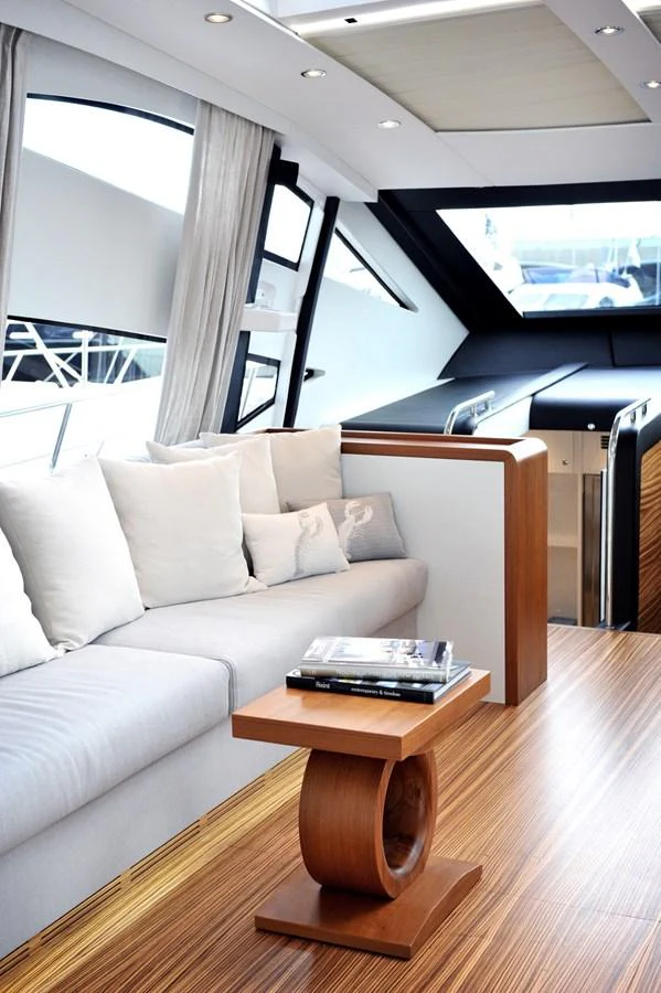 The salon features a modern and elegant design with ample natural light and luxurious furnishings. aboard SARNICO GRANDE HULL #3 Yacht for Sale